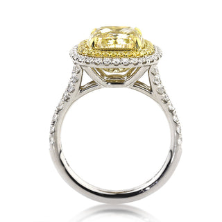 Yellow cushion double halo moissanite engagement ring close up detail