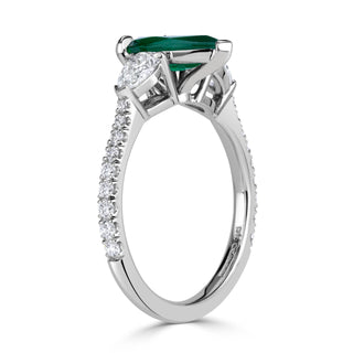 Green pear three stone moissanite engagement ring close up detail