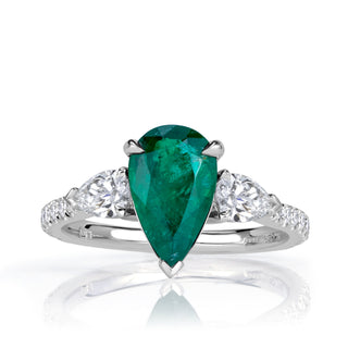 Green pear three stone moissanite engagement ring front view