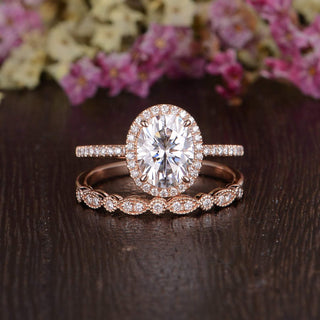 Bold 1.50ct oval halo moissanite ring three quarter angled view