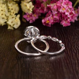 Modern 1.50ct oval halo moissanite ring top view