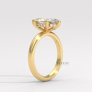Front view of a marquise cut moissanite engagement ring in a hidden halo solitaire setting