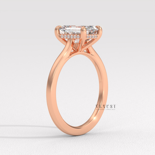 Rose gold emerald cut moissanite ring on hand  Emerald Cathedral Halo detail view 8