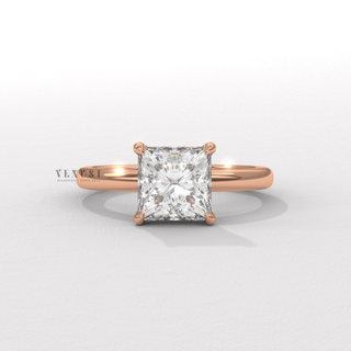 Princess cut moissanite engagement ring in a hidden halo solitaire setting worn on a hand