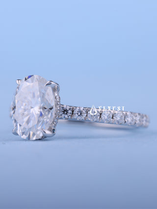 Sparkling 1.50ct oval hidden halo moissanite ring angled view showing its sparkle