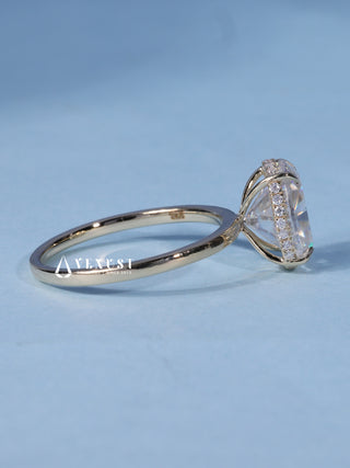 Shimmering 1.50ct cushion hidden halo moissanite ring close up of the setting