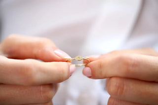 Chic round moissanite wedding band side profile view