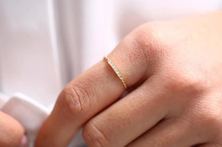 0.05 TCW Minimalist Round Cut Twisted Moissanite Diamond Wedding Band