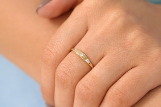 0.06 TCW Round Cut 3 Star Setting Moissanite Diamond Wedding Band