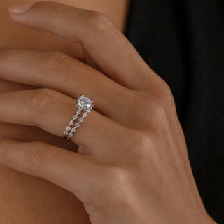 Lustrous round half eternity moissanite wedding band side profile view
