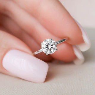 Modern 1.0ct round hidden halo moissanite ring close up of the setting