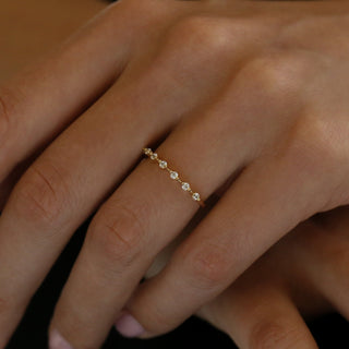 0.10 TCW Round Cut Ultra Thin Bubble Half Floating Moissanite Diamond Wedding Band