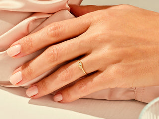Radiant round moissanite wedding band angled view showing its sparkle image 4