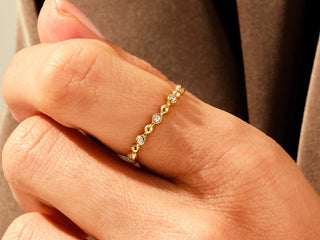 0.08 TCW Round Cut Bezel and Ball Moissanite Diamond Wedding Band