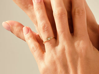Radiant round moissanite wedding band three quarter angled view image 4