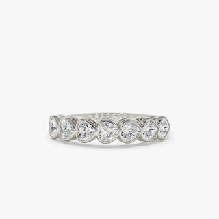 Dazzling heart bezel moissanite wedding band close up of the setting