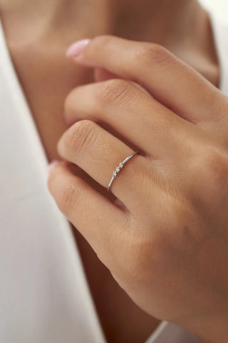 0.05 TCW Round Cut Three Stone Moissanite Diamond Wedding Band
