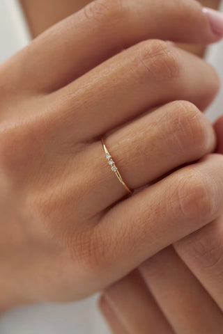 0.05 TCW Round Cut Three Stone Moissanite Diamond Wedding Band