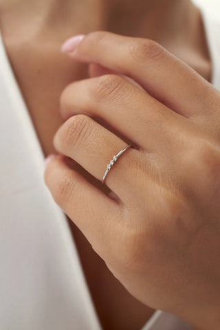 0.05 TCW Round Cut Three Stone Moissanite Diamond Wedding Band