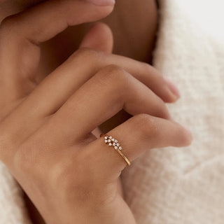 Exquisite round cluster moissanite wedding band angled view showing its sparkle