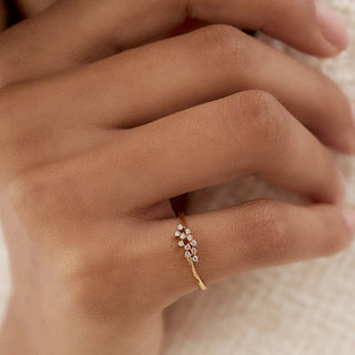 Exquisite round cluster moissanite wedding band front view