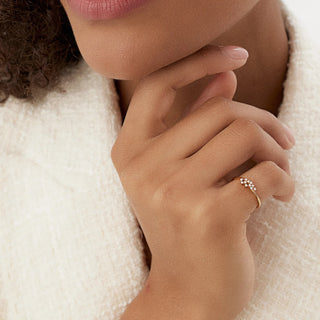 Exquisite round cluster moissanite wedding band side profile view