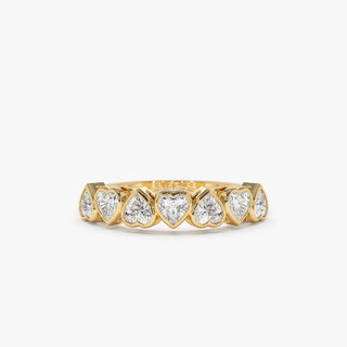 Sparkling heart bezel moissanite wedding band close up of the setting