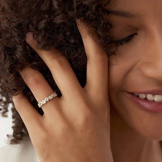 Sparkling heart bezel moissanite wedding band side profile view