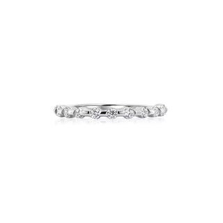 Lustrous round half eternity moissanite wedding band front view