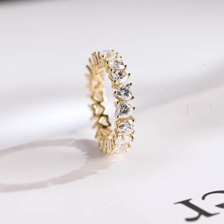 Stunning heart full eternity moissanite wedding band detail view of the band