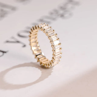 Luminous emerald full eternity moissanite wedding band side profile view