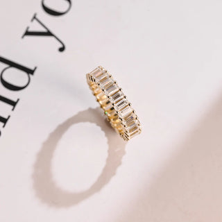 Luminous emerald full eternity moissanite wedding band top view