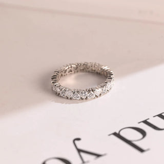 Graceful heart full eternity moissanite wedding band front view