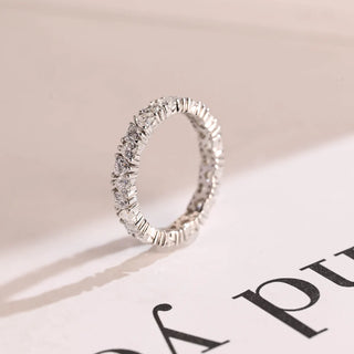 Graceful heart full eternity moissanite wedding band detail view of the band