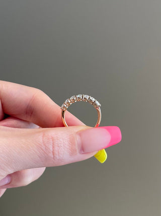 Dazzling round moissanite wedding band side profile view image 12
