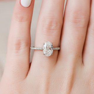 Radiant 2.0ct oval hidden halo moissanite ring angled view showing its sparkle