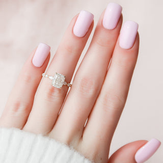 Bold 2.50ct cushion hidden halo moissanite ring angled view showing its sparkle