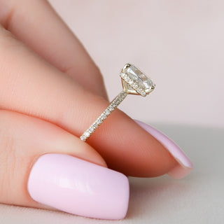 Bold 2.0ct cushion hidden halo moissanite ring shown on a finger image 2