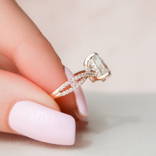 Shimmering 1.0ct pear hidden halo moissanite ring side profile view