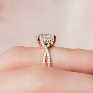 Delicate 1.0ct pear hidden halo moissanite ring close up of the setting