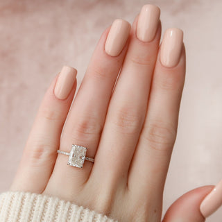 Gorgeous 3.0ct radiant hidden halo moissanite ring angled view showing its sparkle