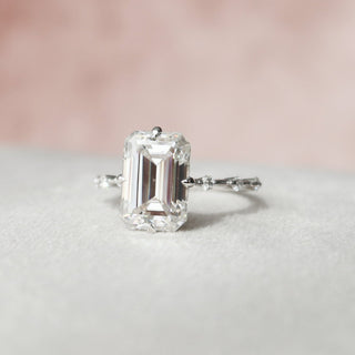 Sparkling 3.0ct emerald solitaire moissanite ring three quarter angled view