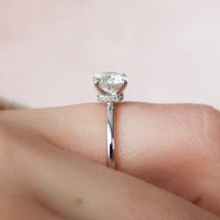 Modern 1.0ct round hidden halo moissanite ring three quarter angled view