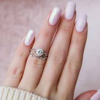 Timeless 1.0ct round moissanite ring angled view showing its sparkle
