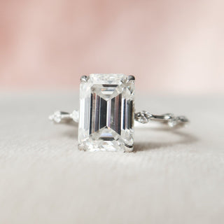 Delicate 3.0ct emerald solitaire moissanite ring detail view of the band