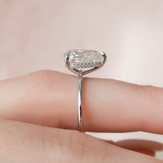 Brilliant 2.0ct pear hidden halo moissanite ring top view