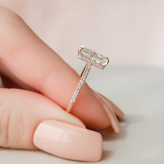 Gorgeous 3.0ct radiant hidden halo moissanite ring shown on a finger