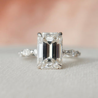 Modern 3.0ct emerald hidden halo moissanite ring overhead view