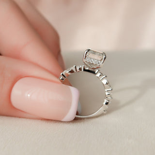 Modern 3.0ct emerald hidden halo moissanite ring three quarter angled view
