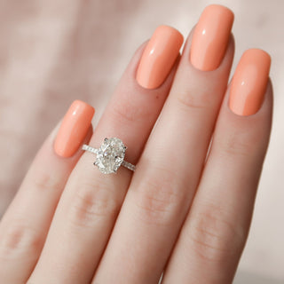 Graceful 2.0ct oval hidden halo moissanite ring three quarter angled view